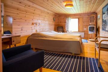 Фото номера Дом с 4 спальнями Дома для отпуска Resort Naaranlahti Cottages г. Нааранлахти 13