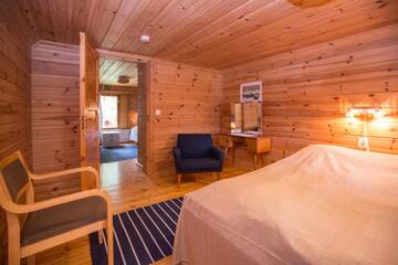 Фото номера Дом с 4 спальнями Дома для отпуска Resort Naaranlahti Cottages г. Нааранлахти 14