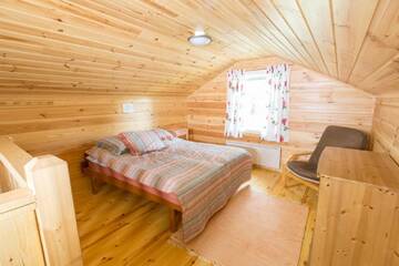 Фото номера Дом с 3 спальнями Дома для отпуска Resort Naaranlahti Cottages г. Нааранлахти 5