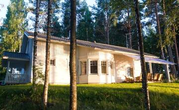 Фото номера Дом с 3 спальнями Дома для отпуска Resort Naaranlahti Cottages г. Нааранлахти 2