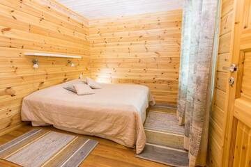 Фото номера Дом с 3 спальнями Дома для отпуска Resort Naaranlahti Cottages г. Нааранлахти 9