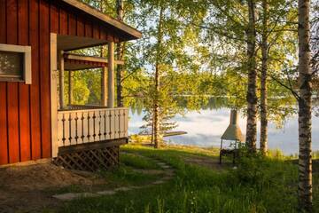 Фото номера Коттедж с 2 спальнями и сауной Дома для отпуска Resort Naaranlahti Cottages г. Нааранлахти 4