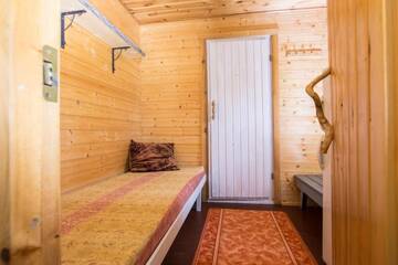 Фото номера Коттедж с 2 спальнями и сауной Дома для отпуска Resort Naaranlahti Cottages г. Нааранлахти 24