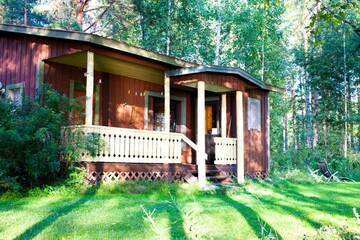 Фото номера Коттедж с 2 спальнями и сауной Дома для отпуска Resort Naaranlahti Cottages г. Нааранлахти 26