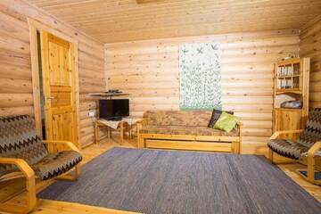 Фото номера Большой коттедж с 2 спальнями и сауной Дома для отпуска Resort Naaranlahti Cottages г. Нааранлахти 8