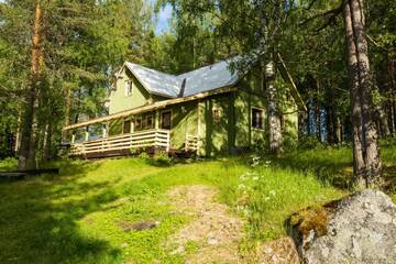 Фото номера Дом с 4 спальнями Дома для отпуска Resort Naaranlahti Cottages г. Нааранлахти 2